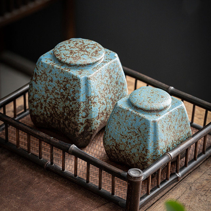 Lattine sigillate da tè a blu greschi di lattine sigillate grandi