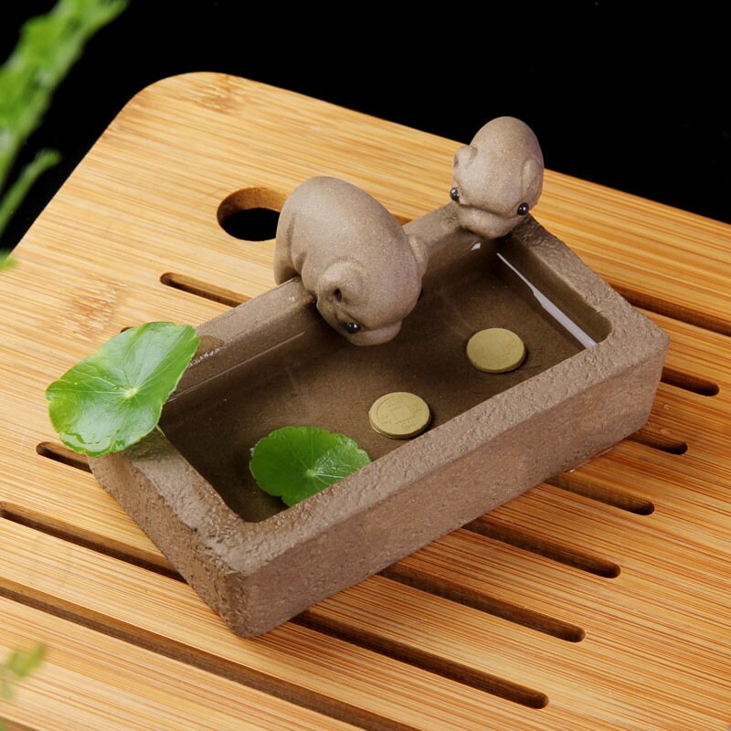 Paarse klei thee huisdier