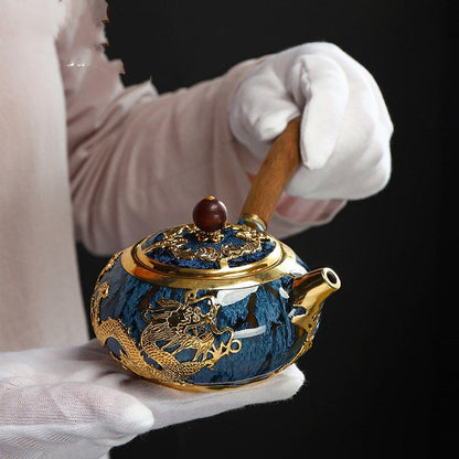 Unik Kung Fu Teapot Emas Buatan tangan Bersalut dengan Pemegang Bahagian Kayu Ebony