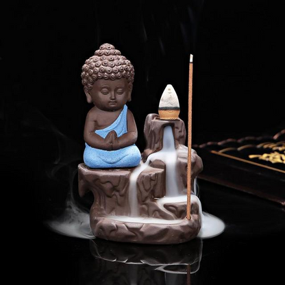 Quemador de incienso de la cascada de humo Buda
