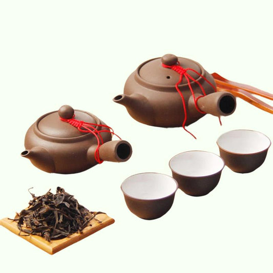 Estilo japonés de arcilla morada hecha a mano té chino juego de té creativo kung fu hervidor de tetera de cerámica filtro de mango de cerámica tetera