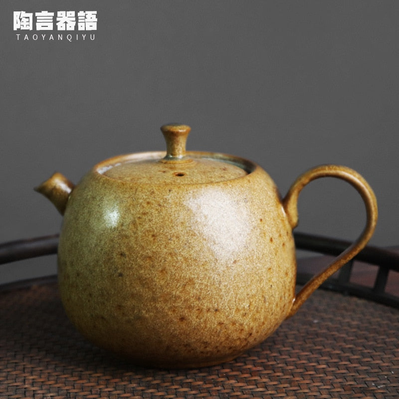 Kinesisk stil retro stengods persimmonform handhållen tekanna, handgjord keramikugn, personlig te tillverkare