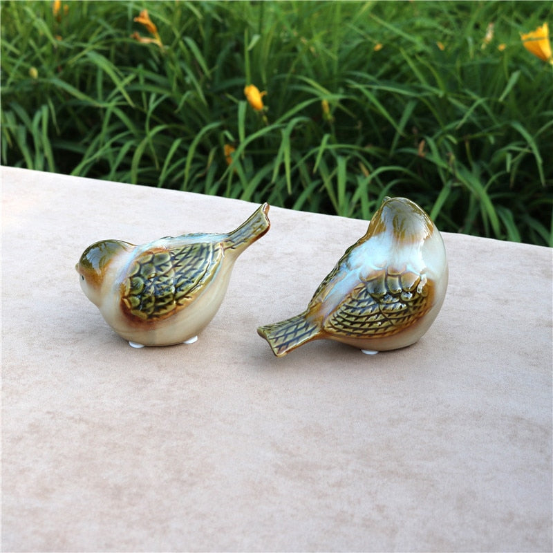 Herkät posliiniläiset lintujen miniatyyri koristeelliset keraamiset lintujen esineen hahmon työpöytäkoristeet