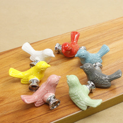 Manico in ceramica di fabbrica europeo moderno cartone animato cassetto per bambini cassetti bianchi manico a buco singolo uccello carino divertimento bambini