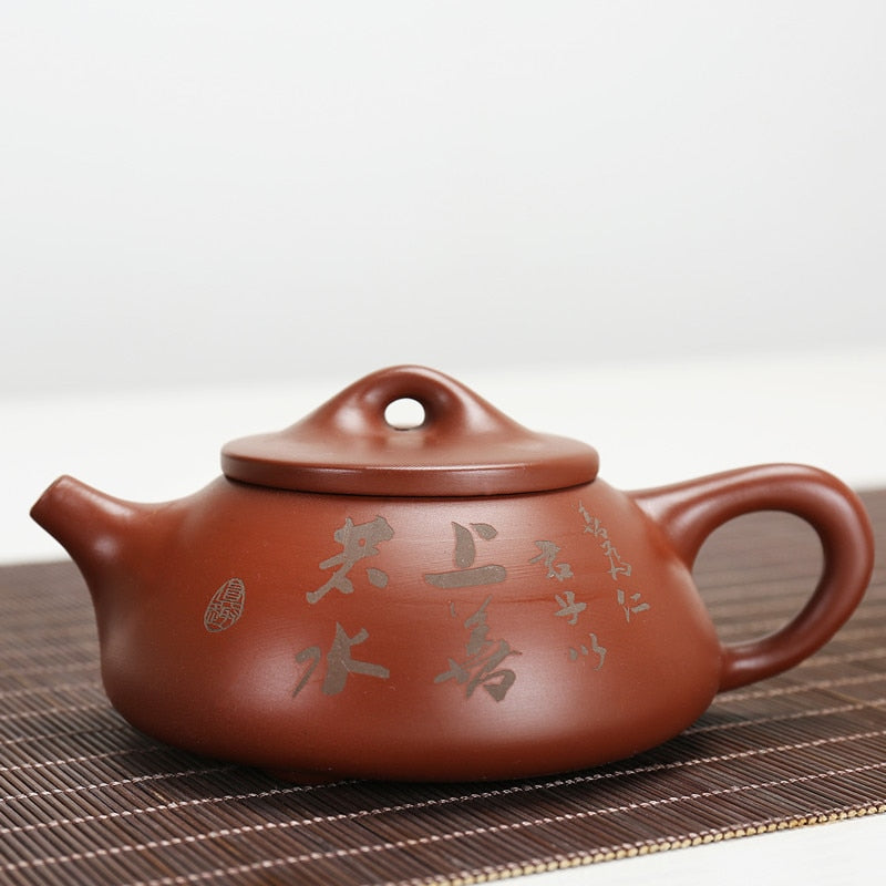 185ml Escrituras budistas artesanales Yixing Purple Clay Tapot Pequeña capacidad Tradicional China China Puer Oolong Té de té