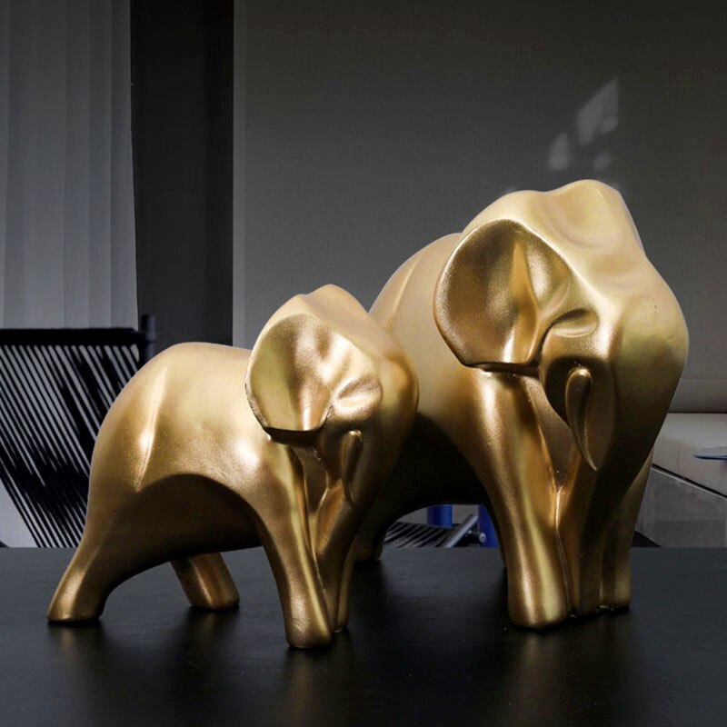 Harpiks europæisk luksus gyldne elefantfigurer til indvendige abstrakte kunstdyrparstatuer Interiørdekorationer