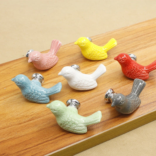 Manico in ceramica di fabbrica europeo moderno cartone animato cassetto per bambini cassetti bianchi manico a buco singolo uccello carino divertimento bambini