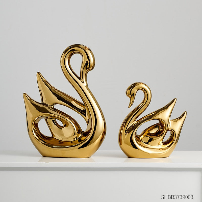 Figuras de animales de oro Regalo Decoración moderna del hogar Decoración de la sala de resina Estatuas y estatuas de la boda Accesorios de escritorio