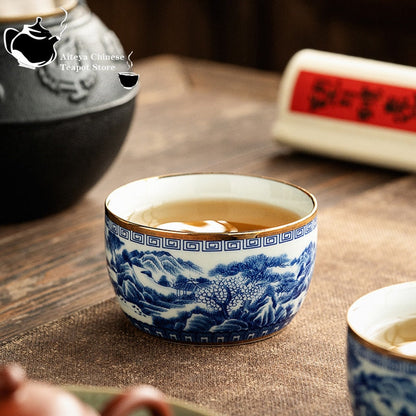 Jingdezhen pintada à mão Blue e White Paisaging Copo Mestre Inclado com Cerâmica de Cerâmica Golada Conjunto de chá Fu, xícara de chá, tigela de chá sofisticada