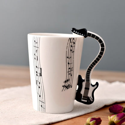 Noved Music Note Copa Ceramic Guitar Mugs Personalidad té/leche/jugo/botella de agua de limón Regalo de cumpleaños de Navidad