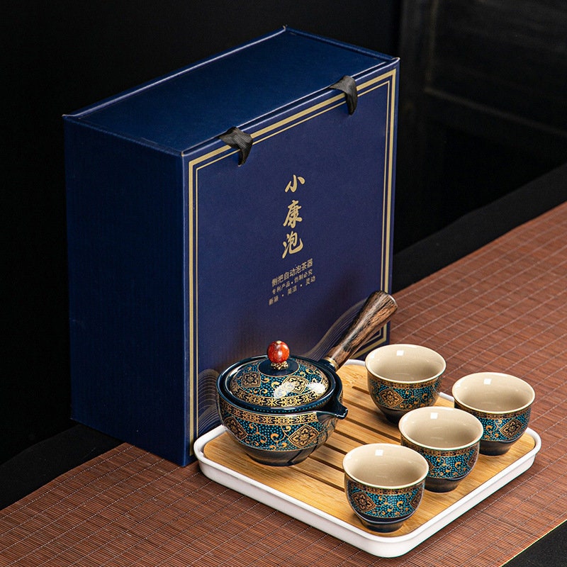 Tragbares Reise-Teeservice aus Keramik – Teekanne, die sich automatisch um 360 Grad dreht – als Geschenk verpackt