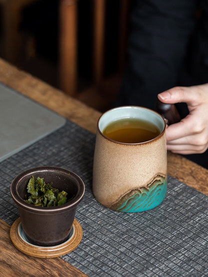 Taza de té de cerámica con tapa e infusor